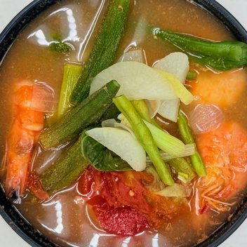 Sinigang na hipon: prawns, okra and kangkong in sour tamarind broth