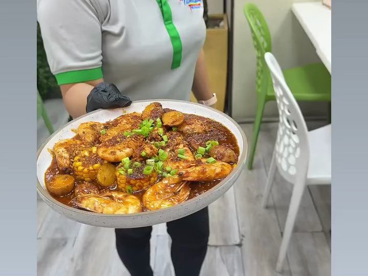 A loaded seafood platter heading to the table