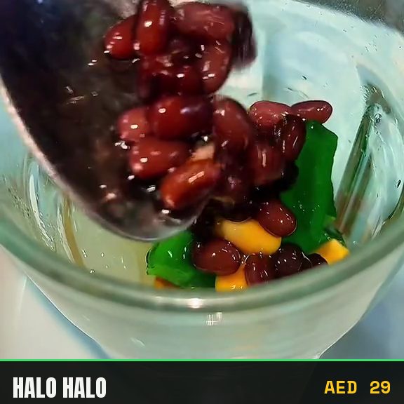 Filipino halo halo dessert layered in a glass at Pinoy Tambayan