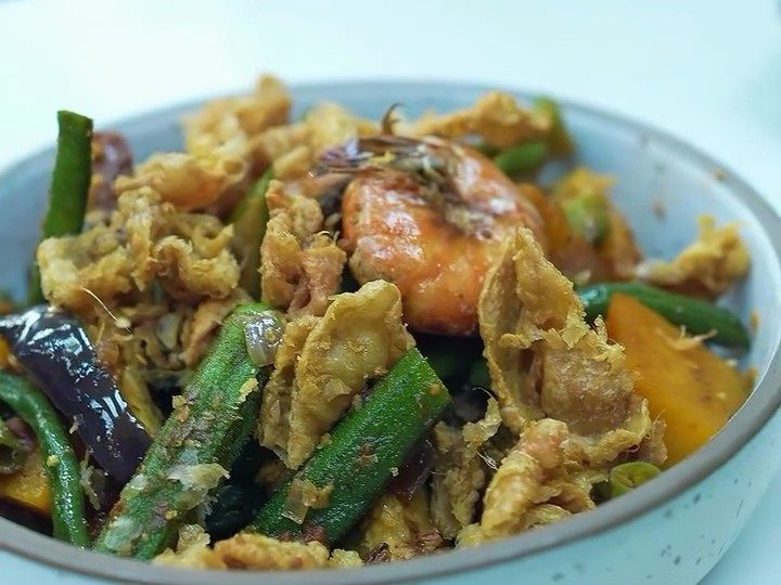 Pinakbet of okra, aubergine, squash and long beans topped with prawns and crisp chicken skin