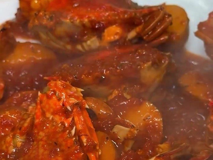 Crab pieces in a thick red Cajun sauce at Pinoy Tambayan