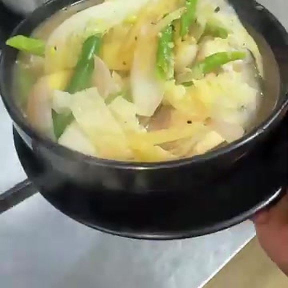 Pesang bangus simmered with cabbage, onion and green chillies in a clear broth at Pinoy Tambayan